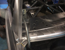 Metal frame of a BMW being repaired in Newquay
